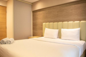 Comfort 2BR Loft Apartment at Maqna Residence By Travelio